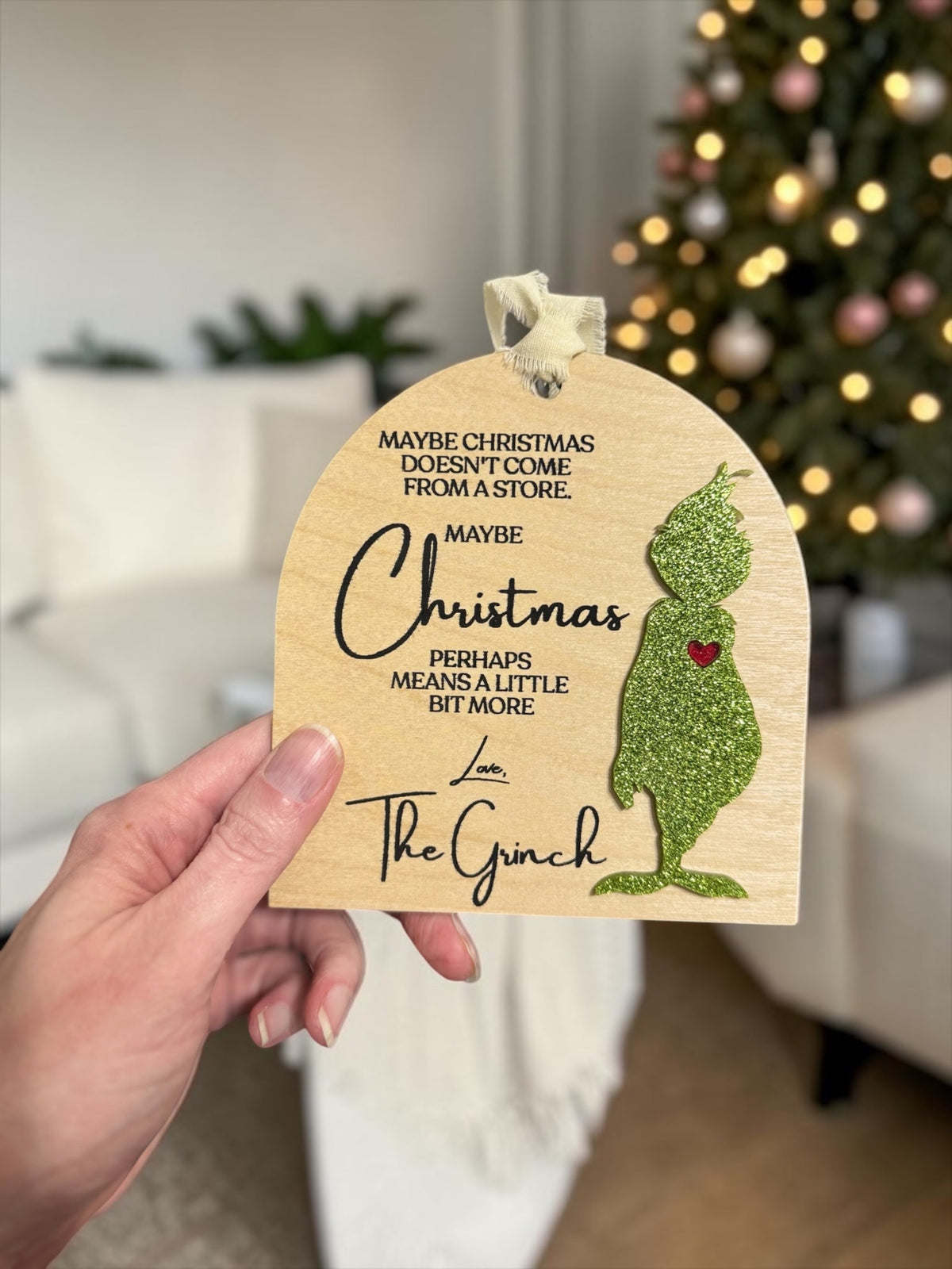 Hand-held birchwood and acrylic Grinch ornament with engraved Christmas message