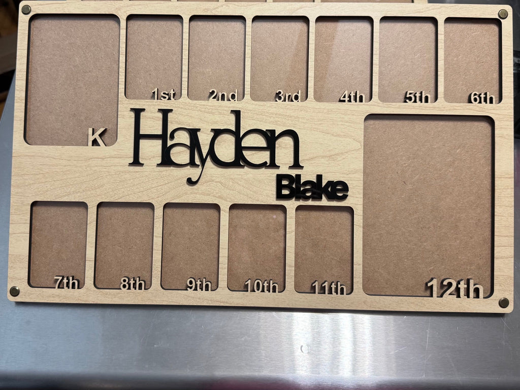 Full view of wooden kindergarten through 12th grade photo frame personalized for Hayden Blake