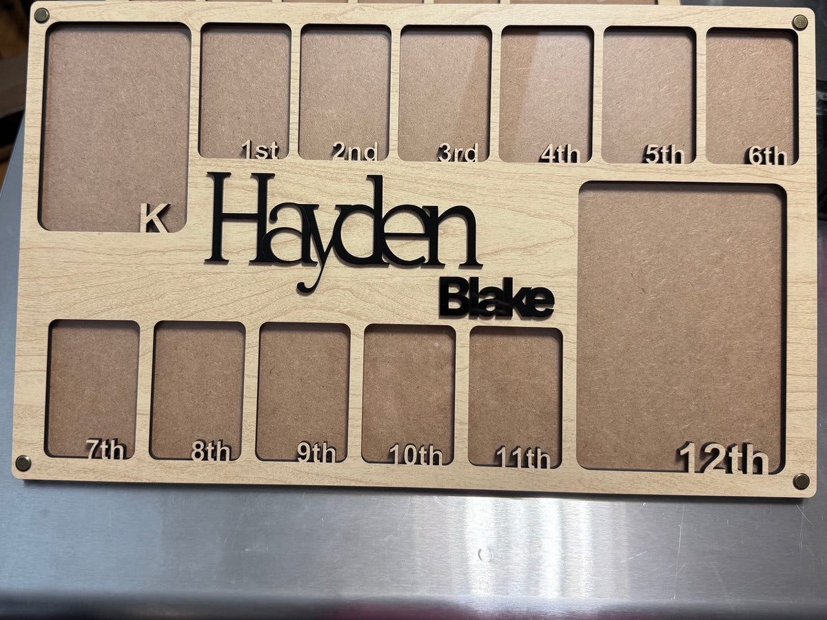 Full view of wooden kindergarten through 12th grade photo frame personalized for Hayden Blake