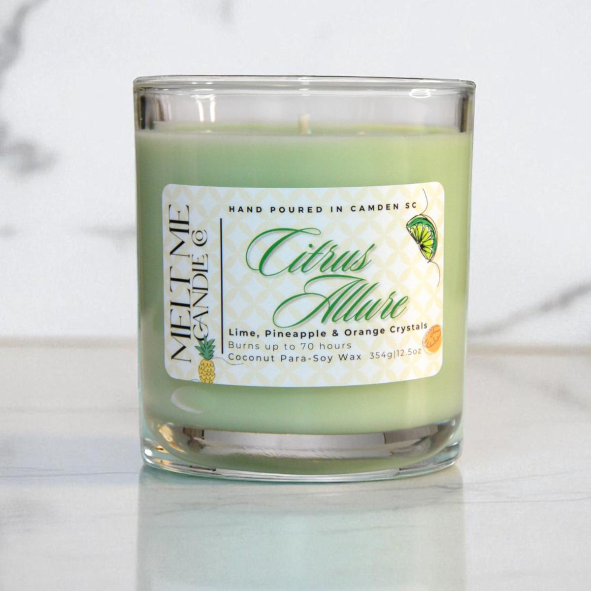 Green candle with a 'Citrus Allure' label on a white background