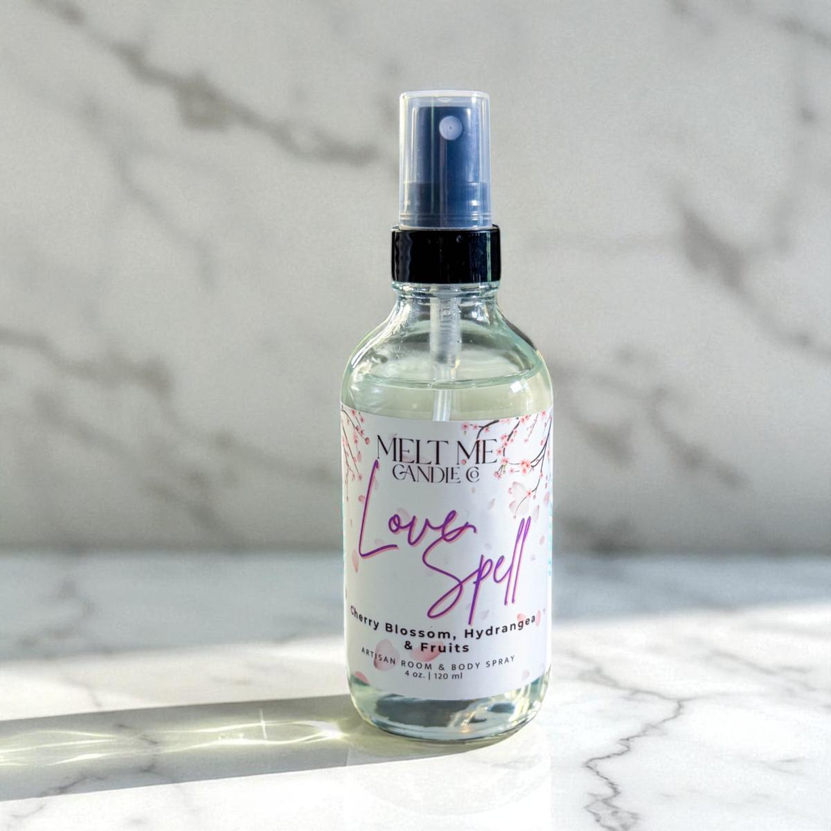 Bottle of 'Love Spell' spray on a marble surface