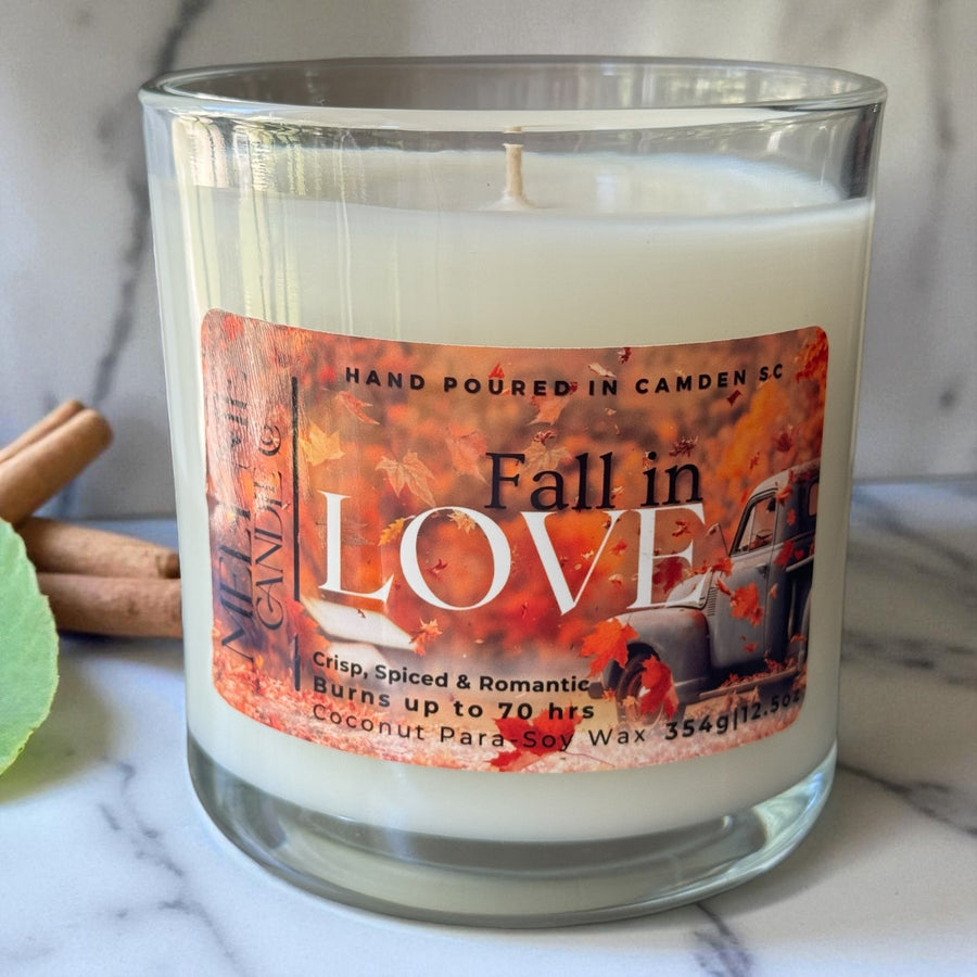 Fall in Love 12.5 oz candle by Melt Me Candle Co with an autumn leaves label