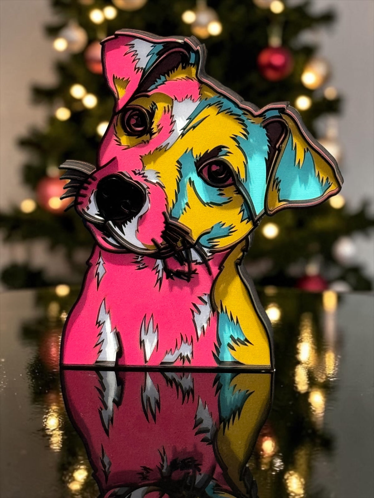 Freestanding colorful six-layer MDF Jack Russell table art in front of a Christmas tree